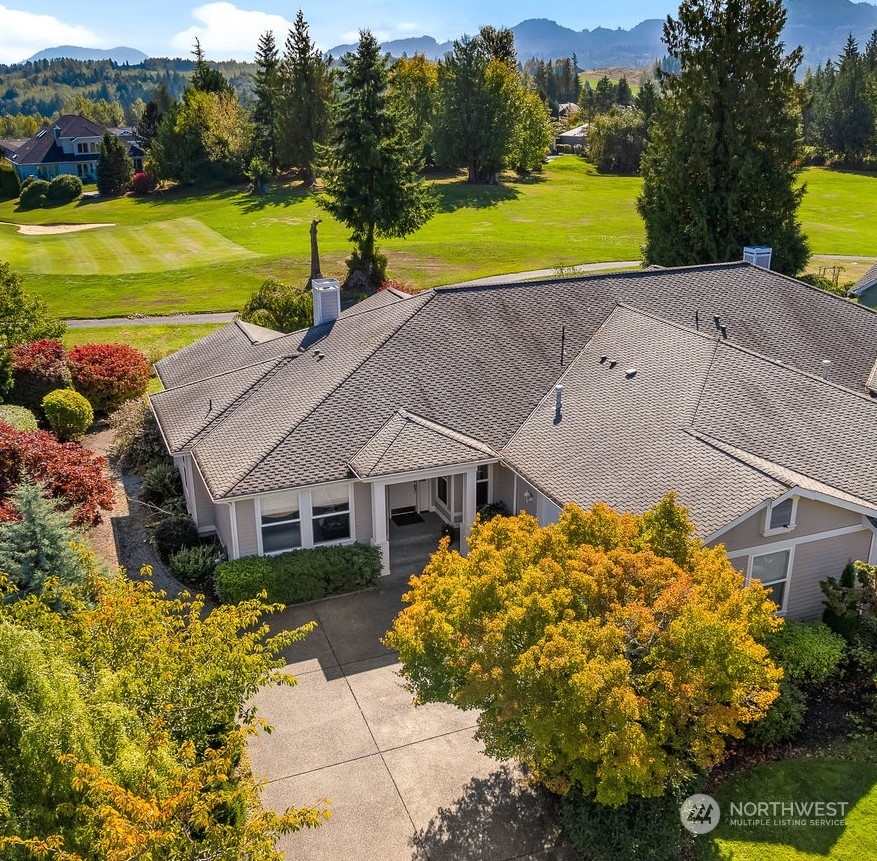 4312 Landmark Drive Mount Vernon, WA 98274 - Photo 1 of 16 a view of a house with a yard and swimming pool
