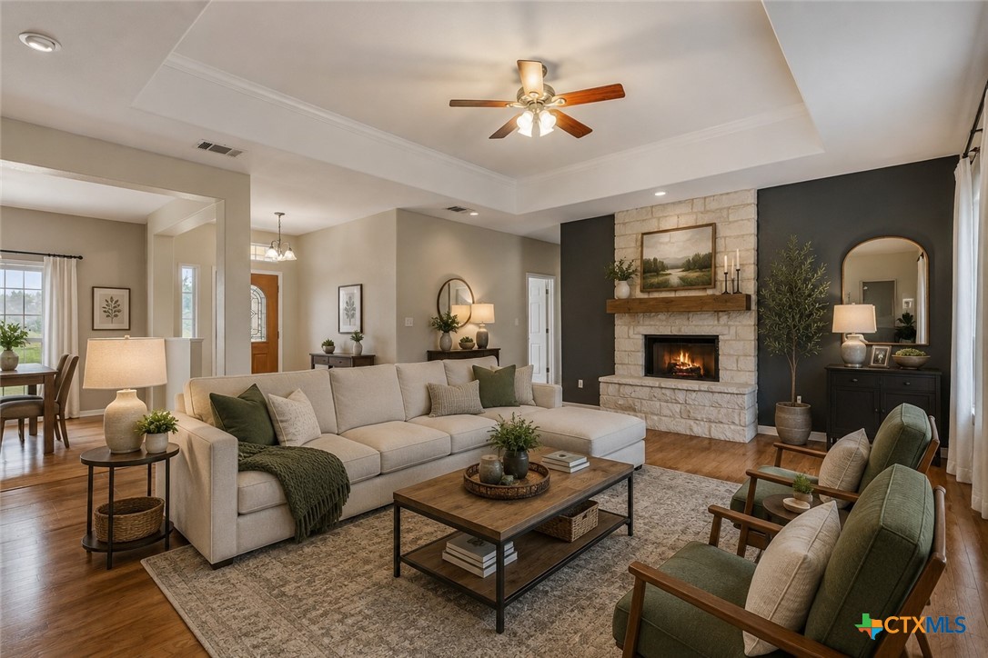 283 County Road 4710 Kempner, TX 76539 - Photo 6 of 47 a living room with furniture and a fireplace