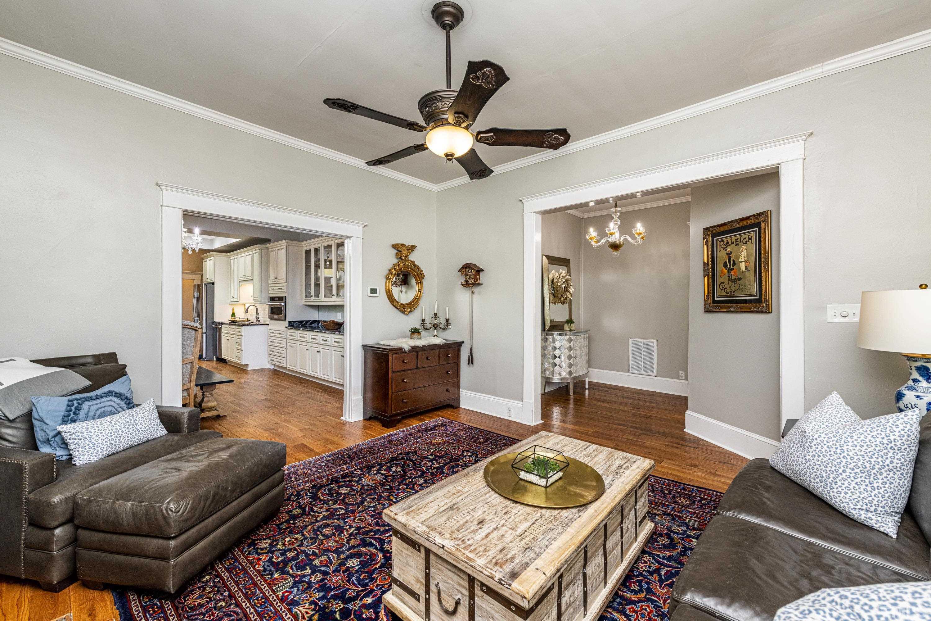 208 Ashe Avenue Raleigh, NC 27605 - Photo 11 of 66 a living room with furniture and wooden floor