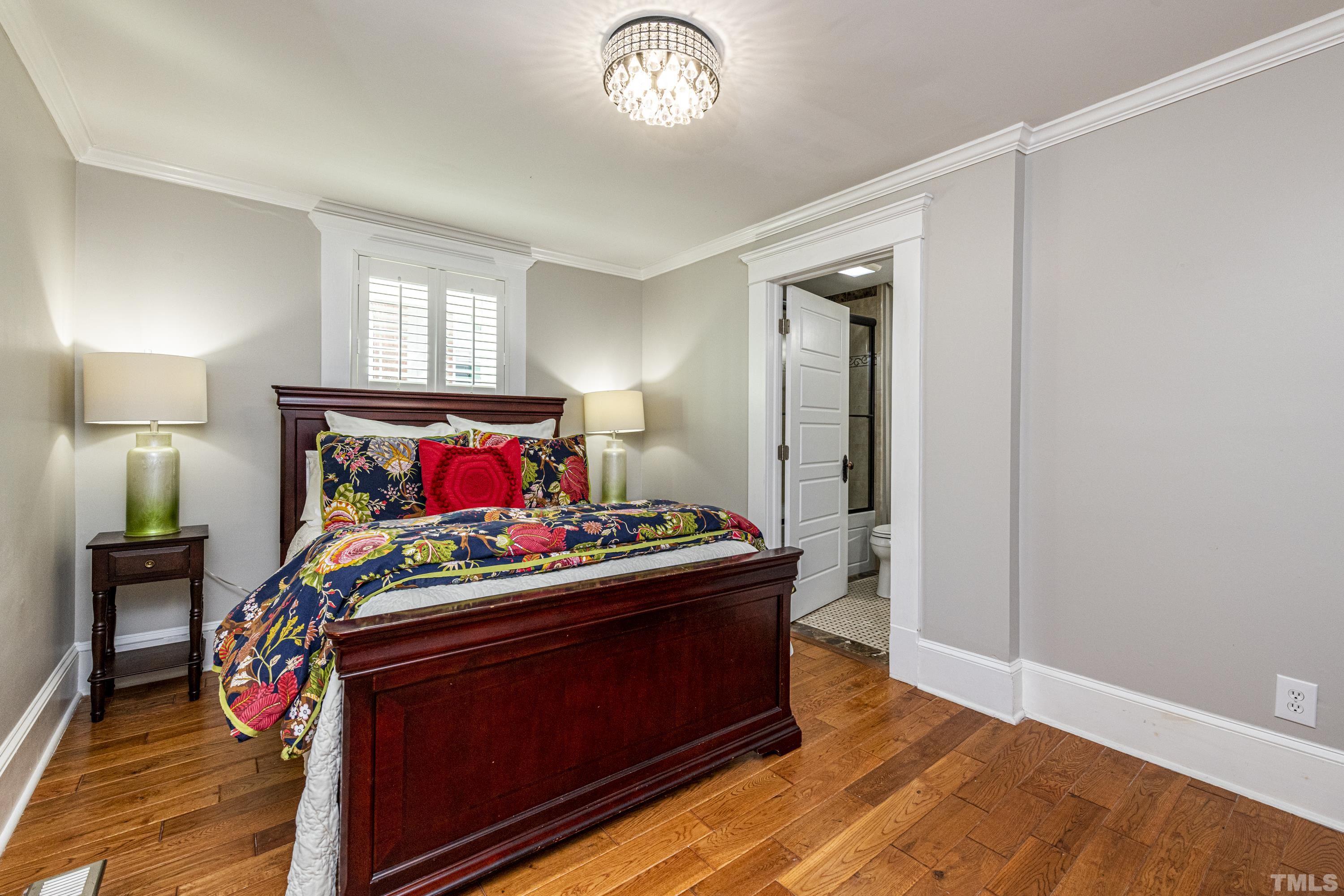208 Ashe Avenue Raleigh, NC 27605 - Photo 22 of 66 a living room with furniture and a flat screen tv