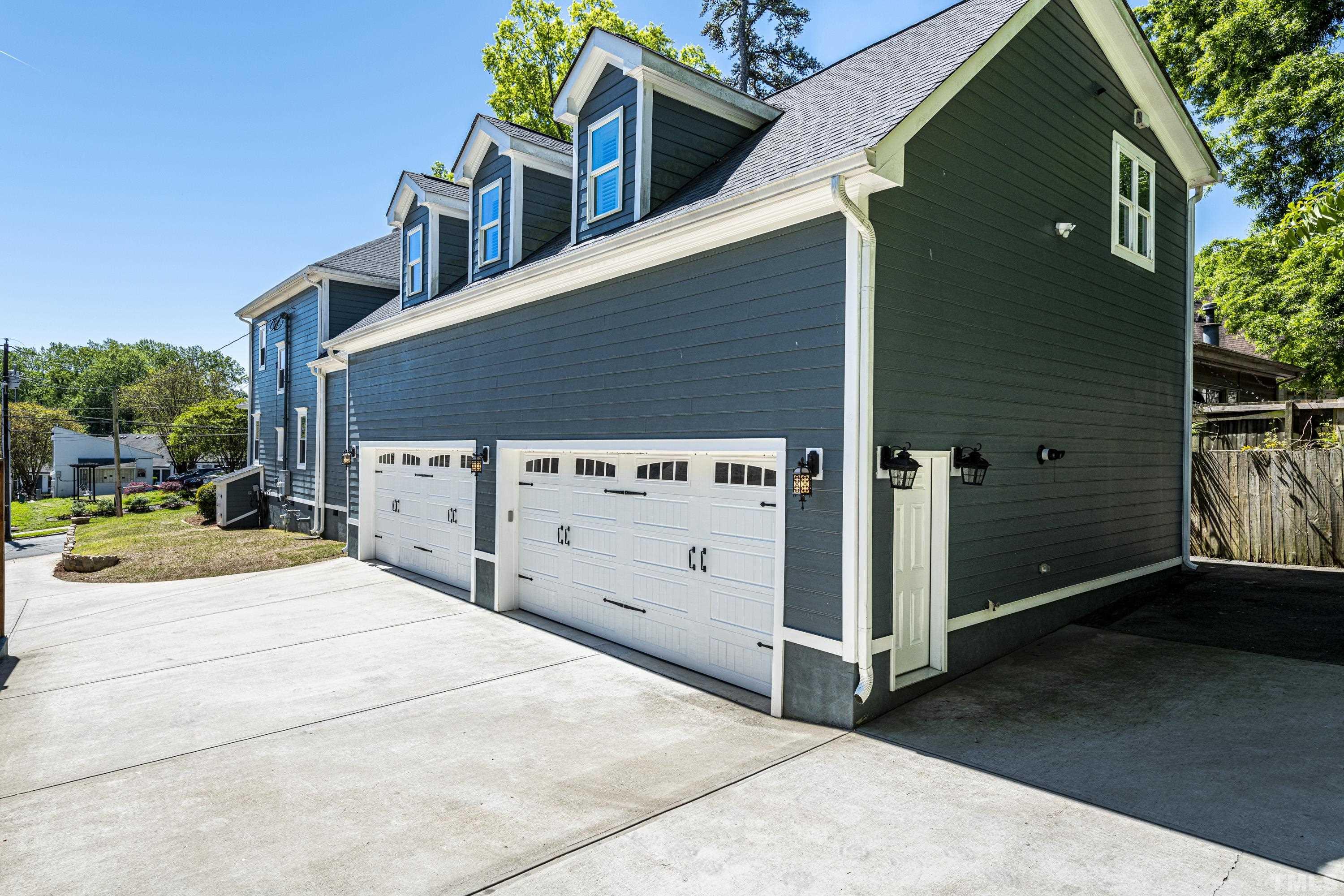 208 Ashe Avenue Raleigh, NC 27605 - Photo 28 of 66 a view of a house with backyard