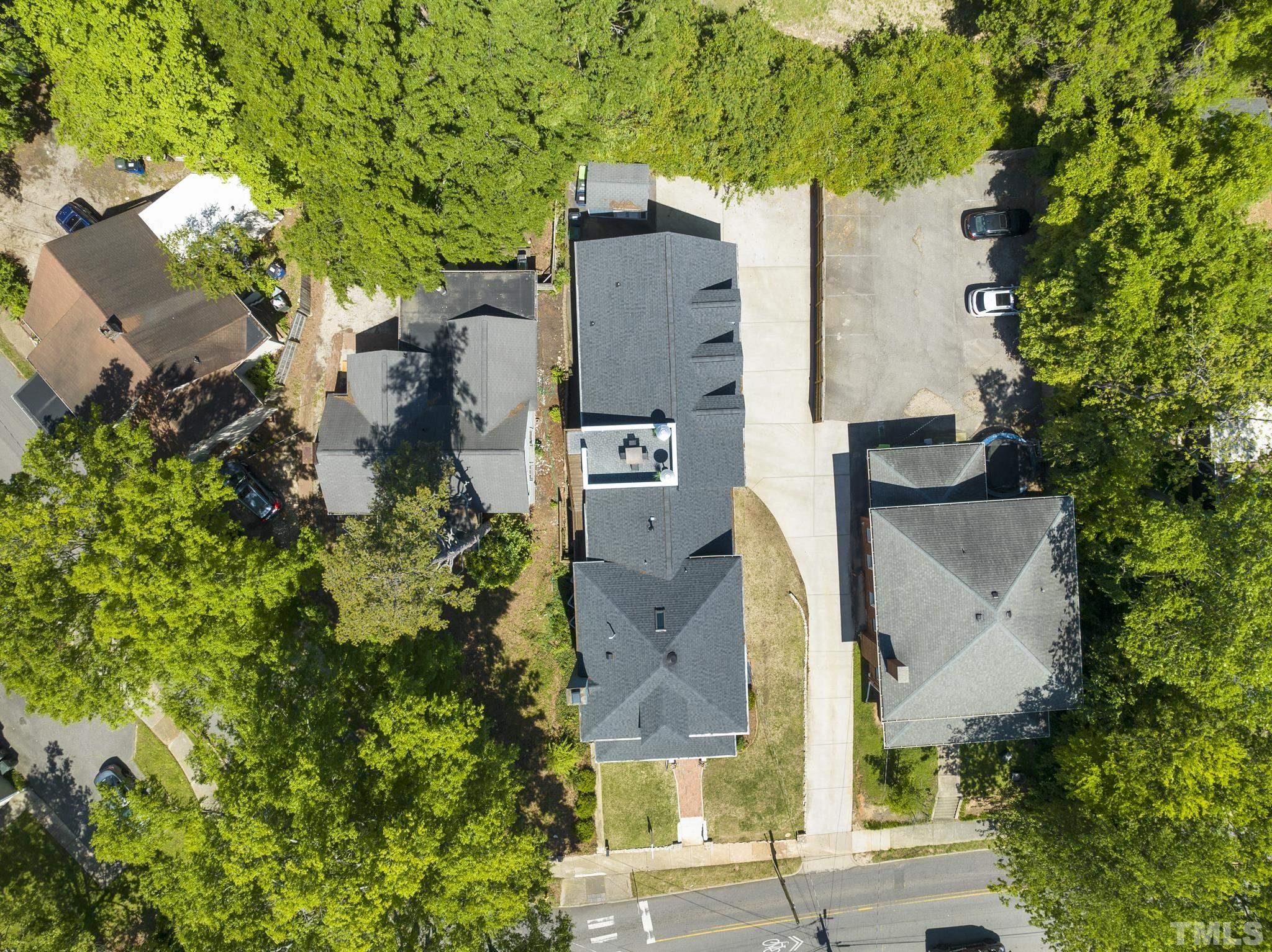 208 Ashe Avenue Raleigh, NC 27605 - Photo 30 of 66 an aerial view of houses with outdoor space