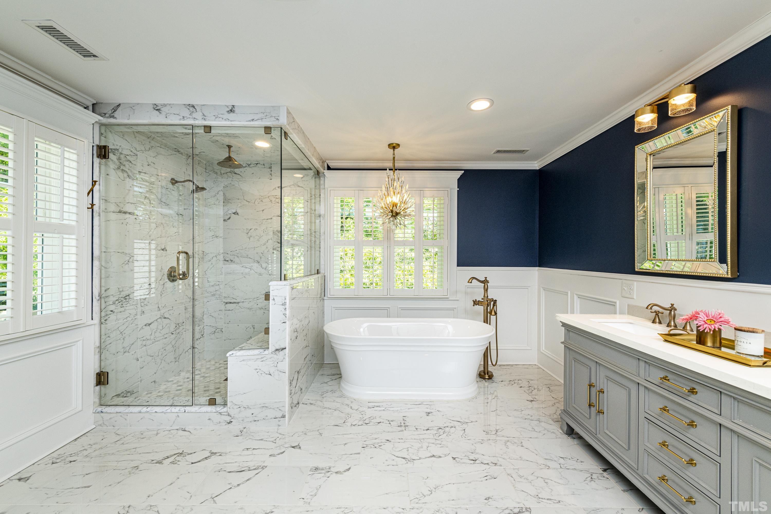 208 Ashe Avenue Raleigh, NC 27605 - Photo 41 of 66 a bathroom with a double vanity sink toilet mirror and bathtub