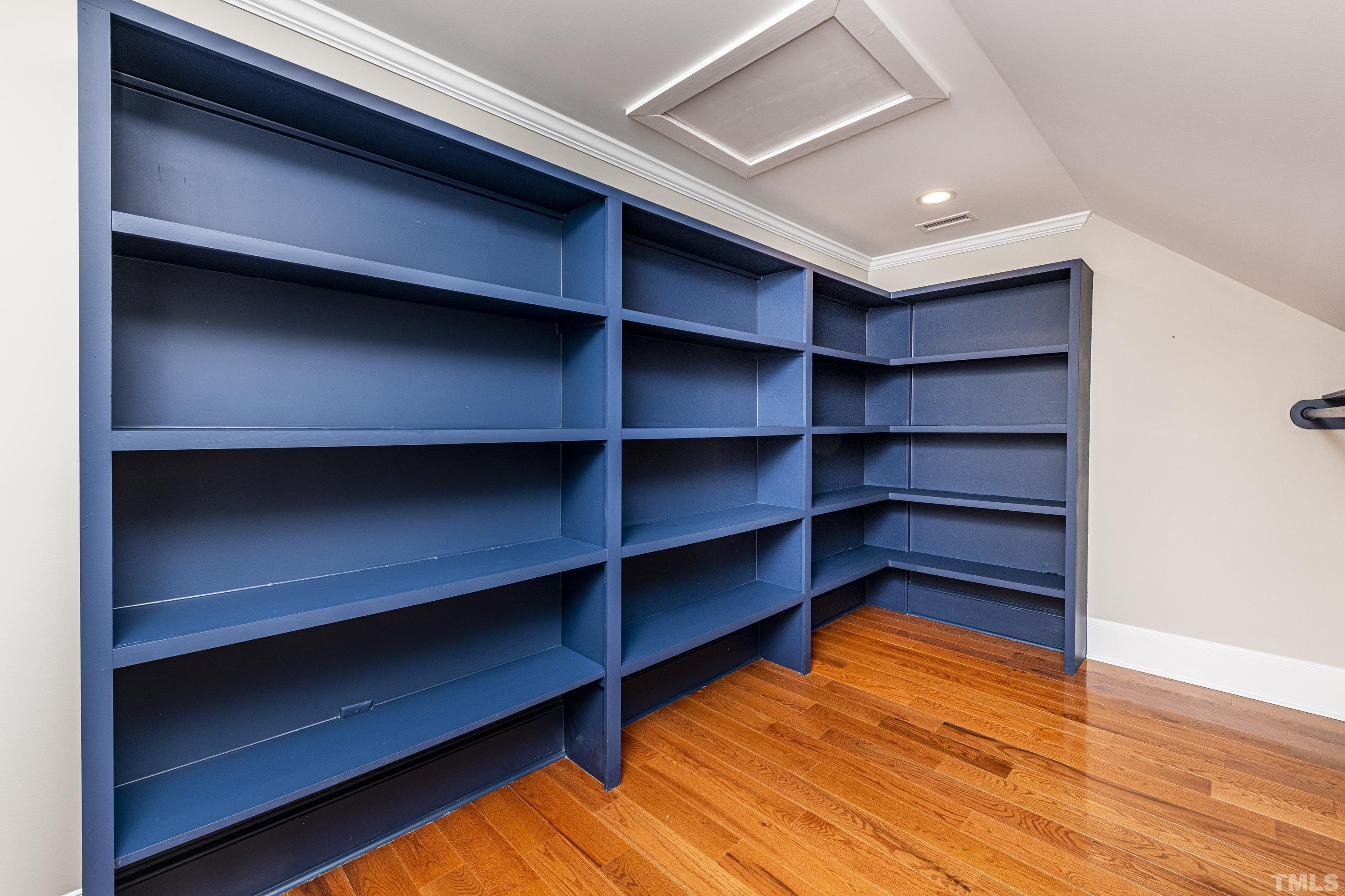 208 Ashe Avenue Raleigh, NC 27605 - Photo 44 of 66 a view of room with empty cabinets and wooden floor
