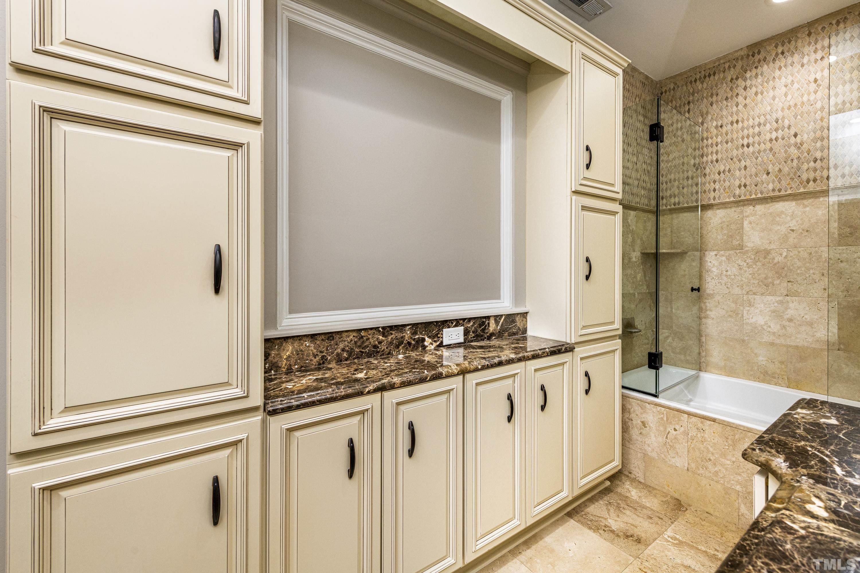 208 Ashe Avenue Raleigh, NC 27605 - Photo 47 of 66 a bathroom with a granite countertop sink and a mirror