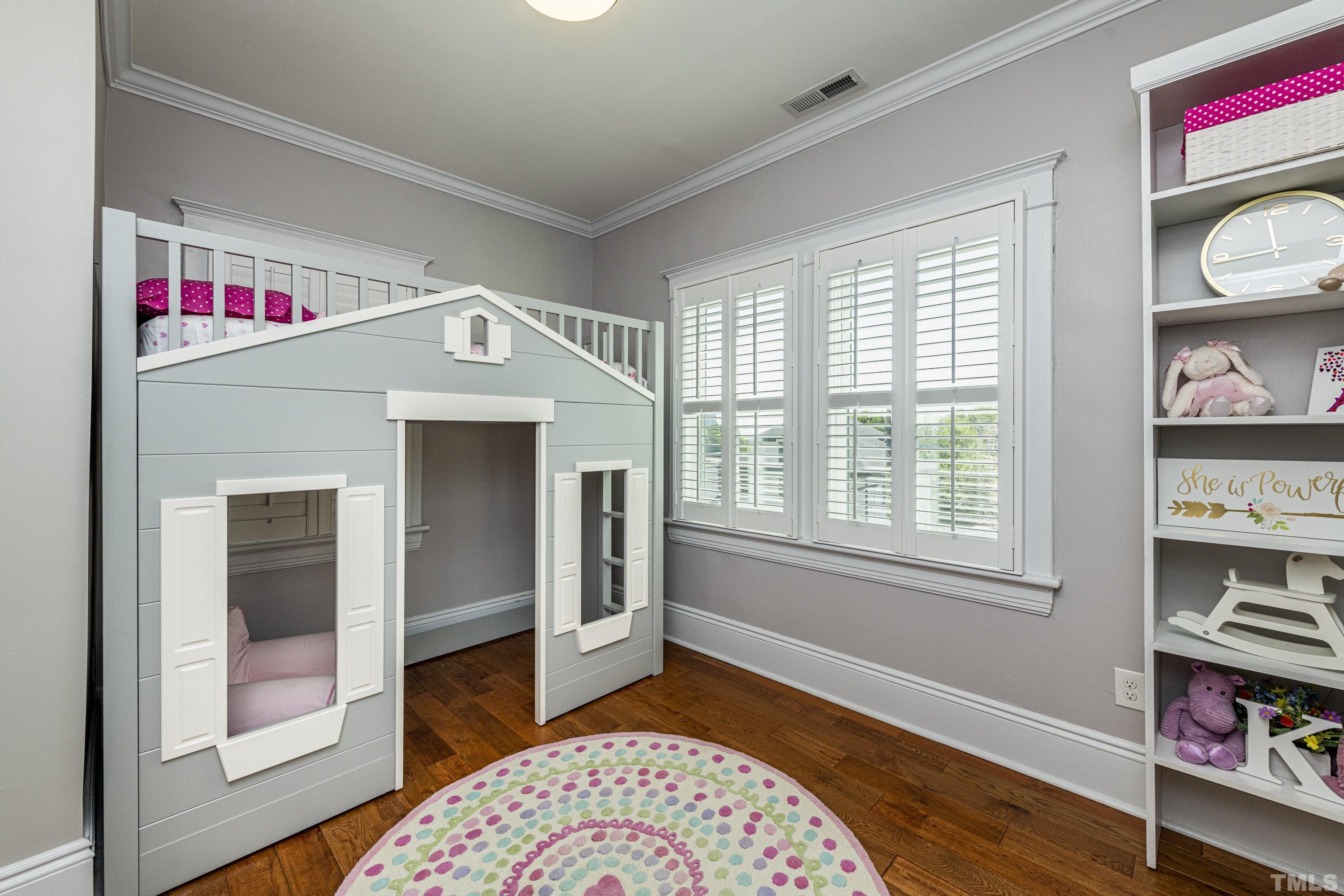 208 Ashe Avenue Raleigh, NC 27605 - Photo 51 of 66 a livingroom with window and hardwood