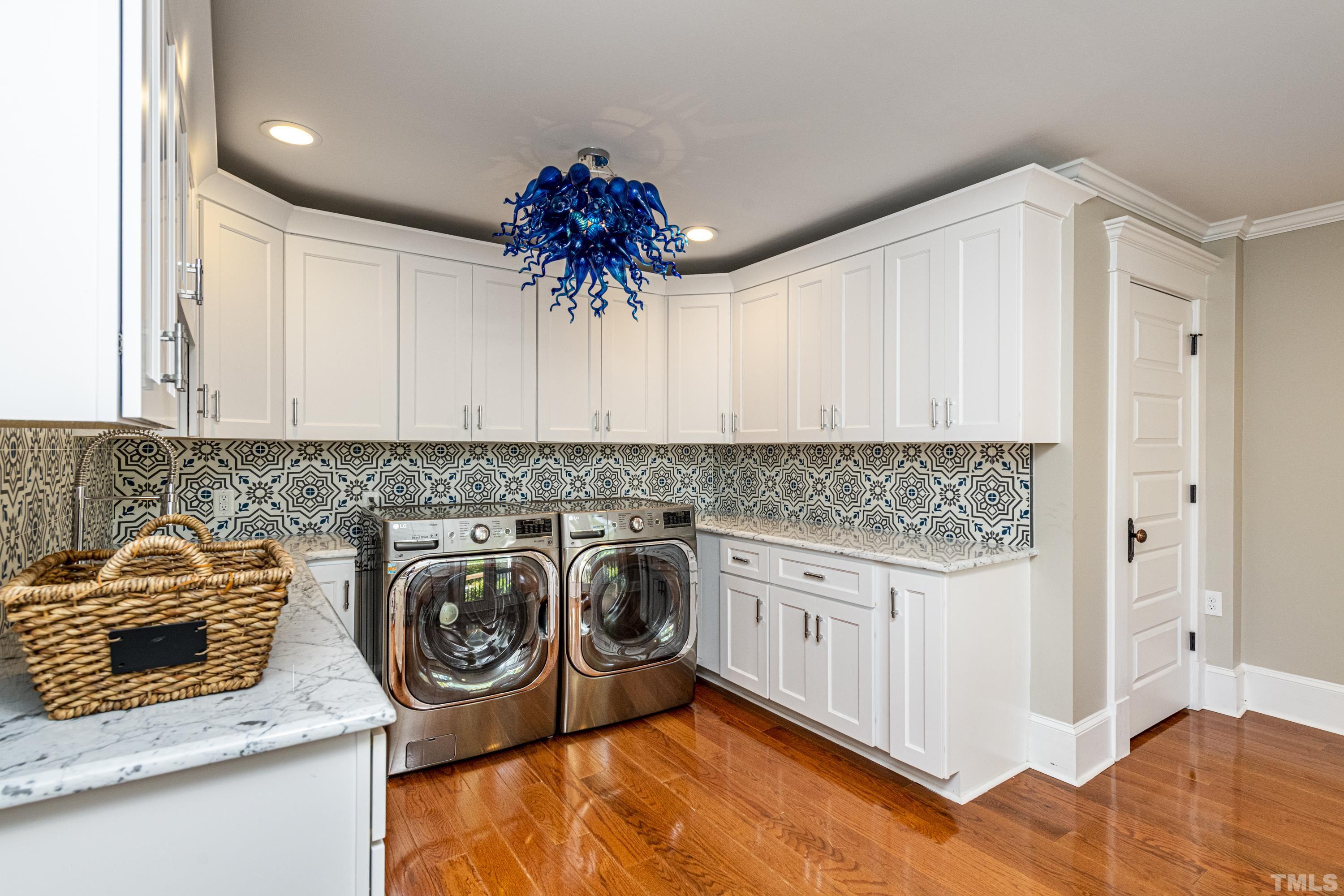208 Ashe Avenue Raleigh, NC 27605 - Photo 52 of 66 a utility room with dryer and washer