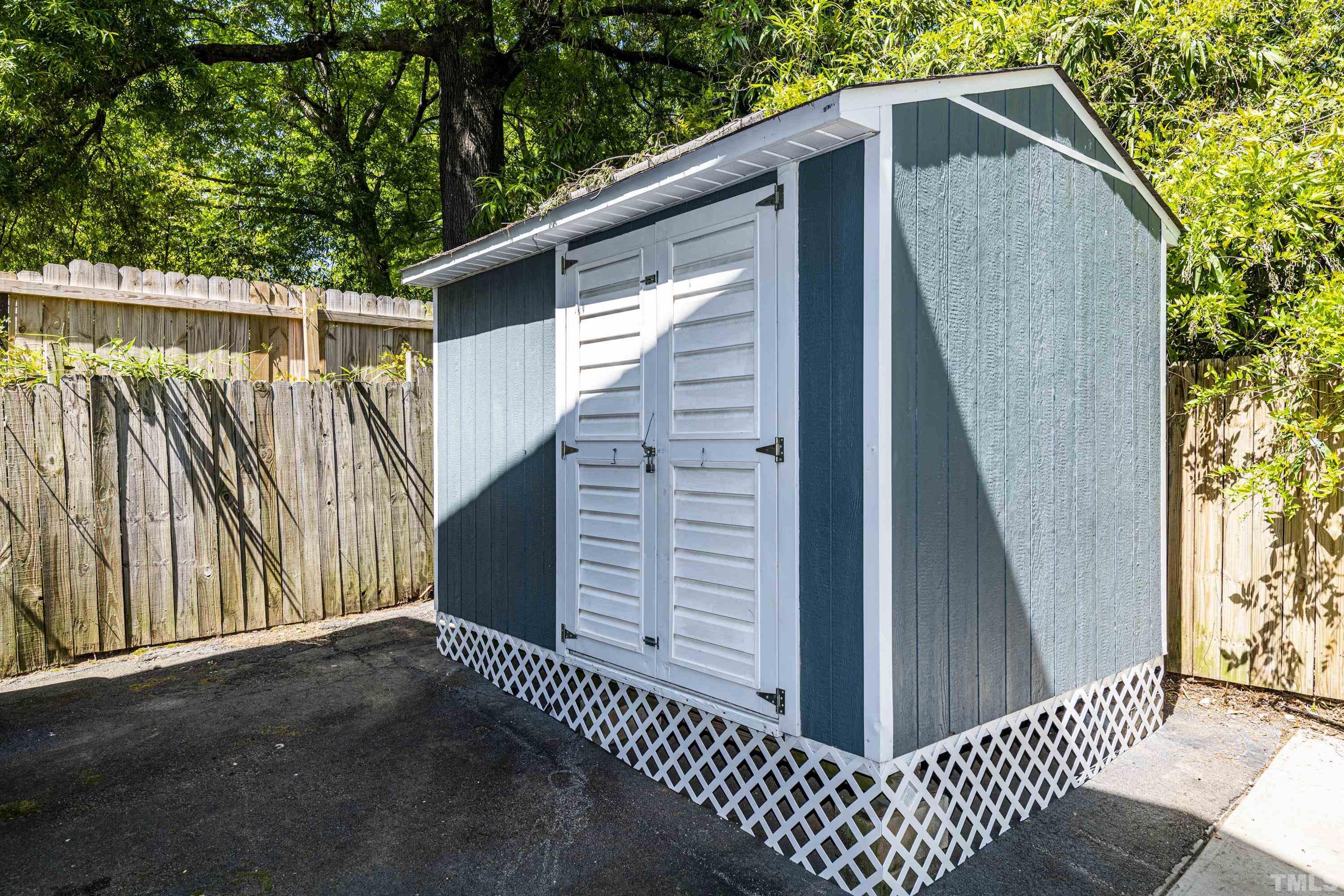 208 Ashe Avenue Raleigh, NC 27605 - Photo 58 of 66 a view of a house with a small cabin