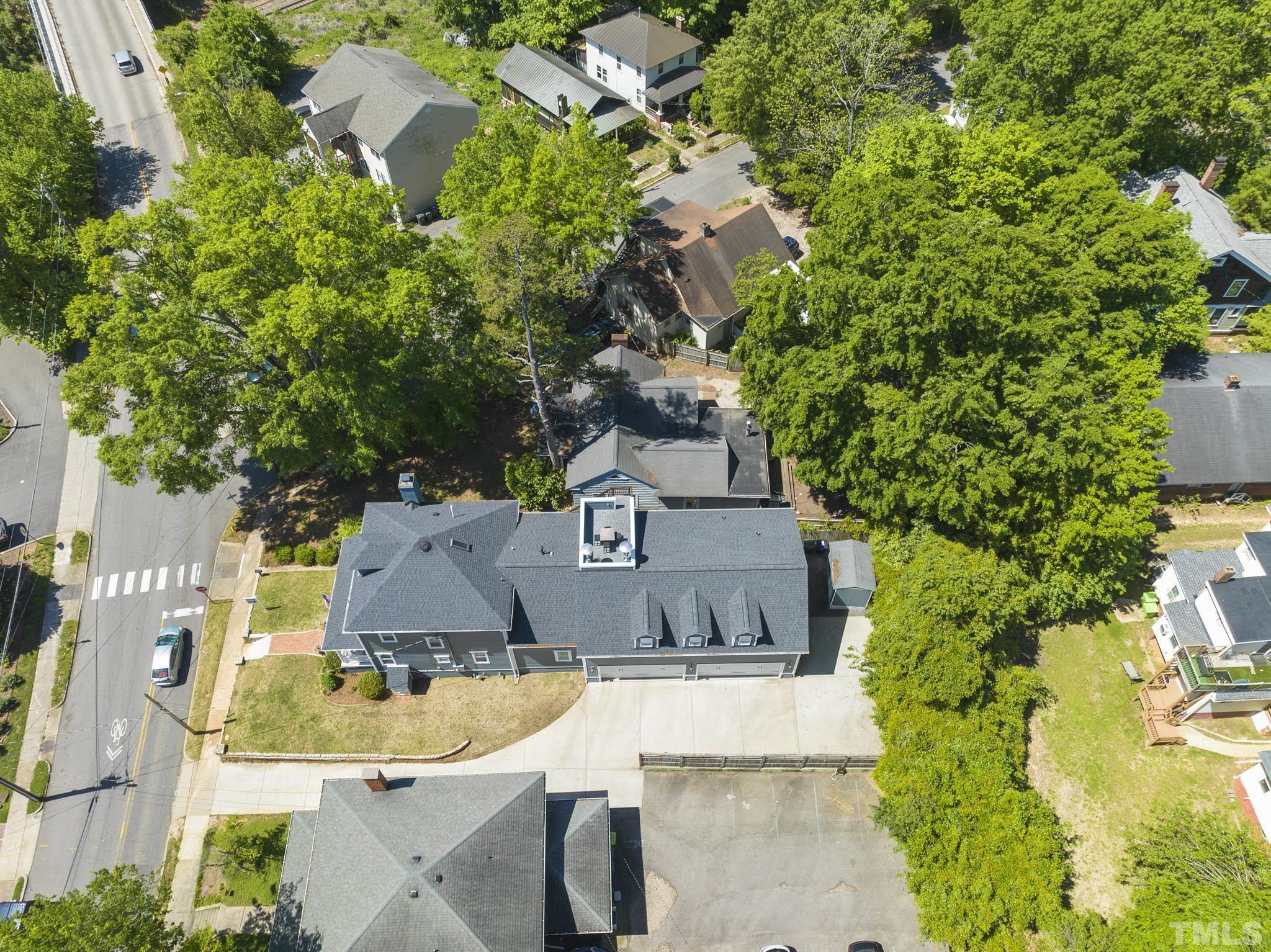 208 Ashe Avenue Raleigh, NC 27605 - Photo 61 of 66 an aerial view of a house with a garden