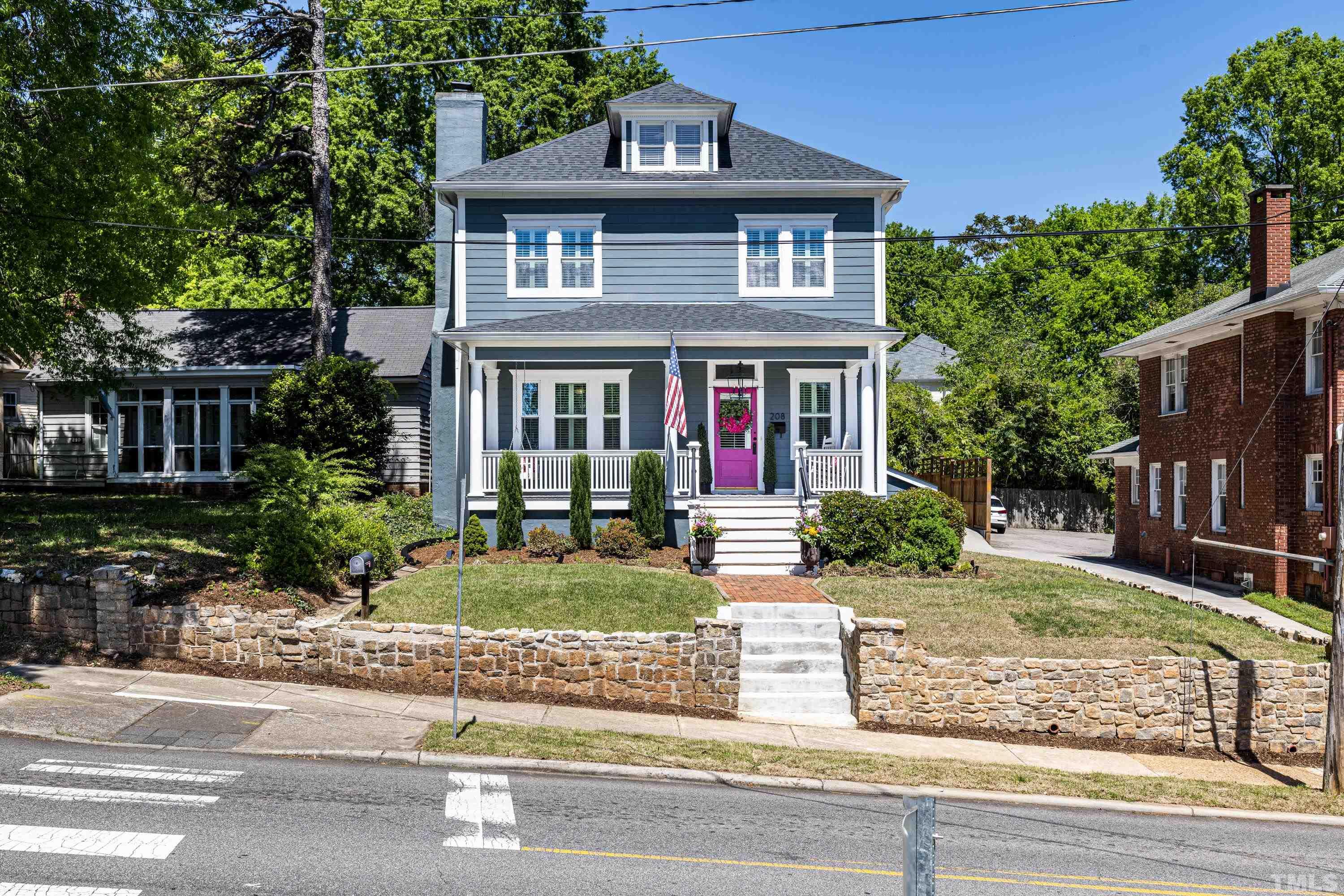 208 Ashe Avenue Raleigh, NC 27605 - Photo 65 of 66 front view of house with a yard