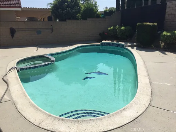 an aerial view of a swimming pool