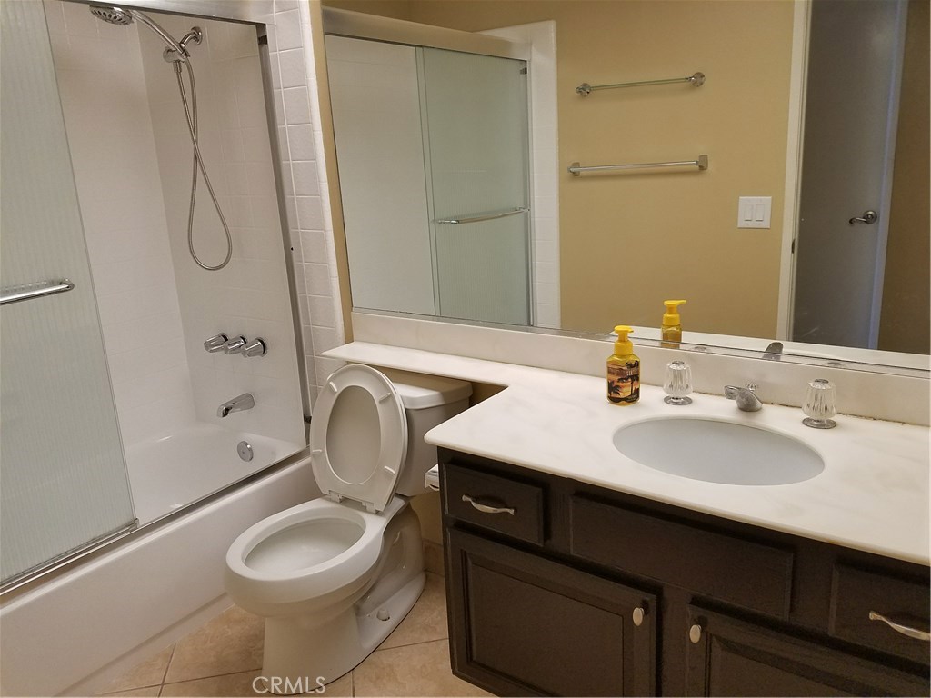 50 Village Loop Road Phillips Ranch, CA 91766 - Photo 36 of 48 a bathroom with a sink toilet and shower