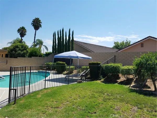 a view of a backyard with a garden