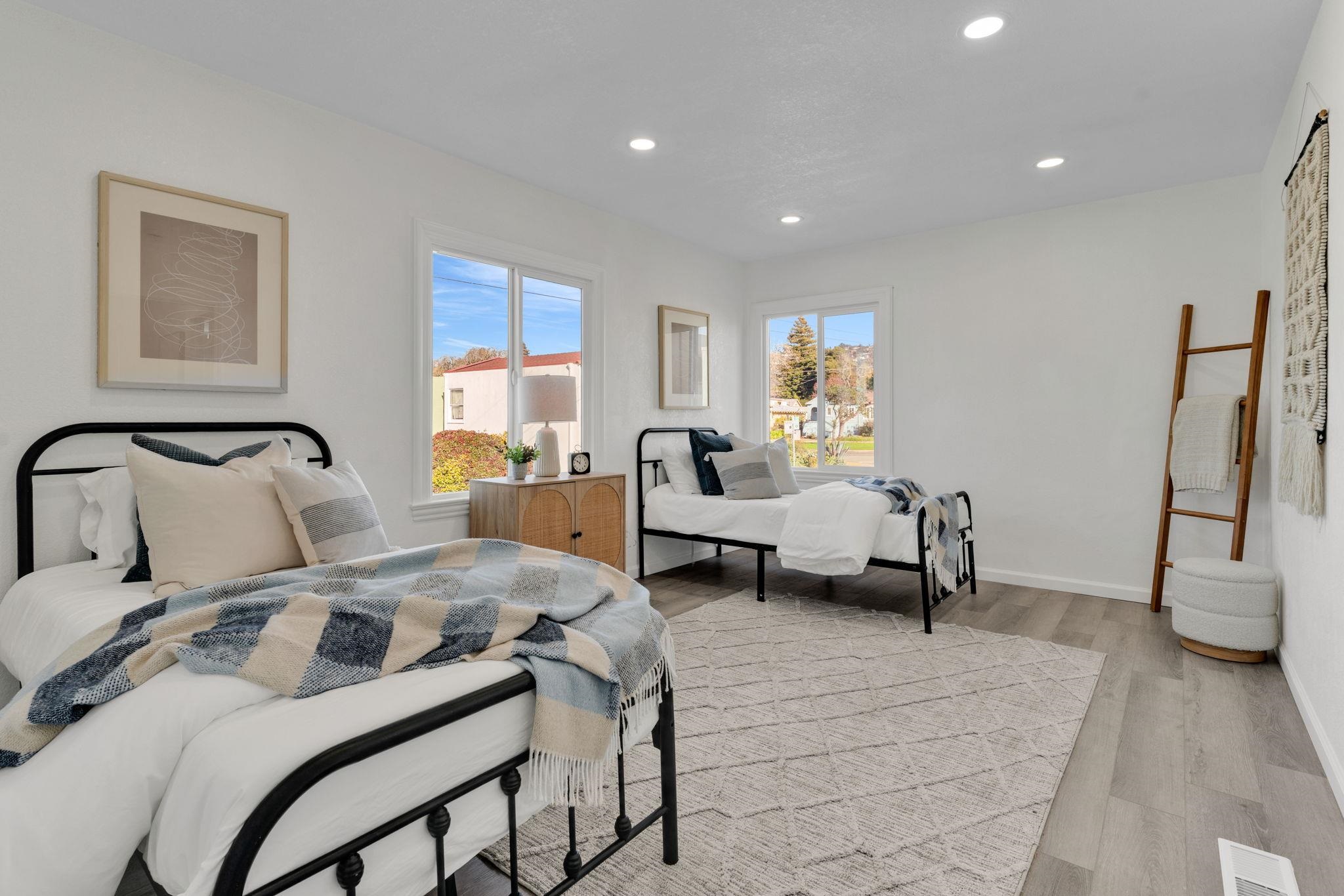 1482 Lincoln Street Berkeley, CA 94702 - Photo 27 of 49 a bedroom with a bed and a couch