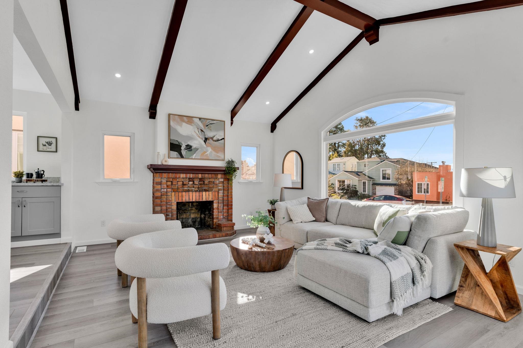 1482 Lincoln Street Berkeley, CA 94702 - Photo 8 of 49 a living room with furniture and a fireplace