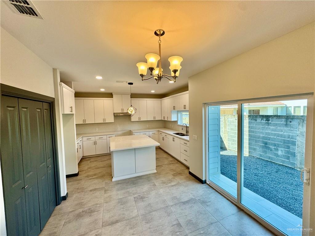 2705 Stablewood Mission, TX 78574 - Photo 5 of 15 a view of a kitchen from the hallway