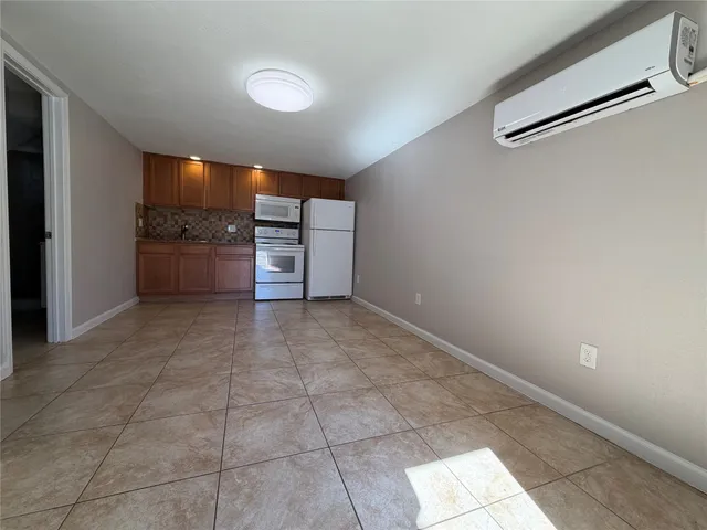 a view of a kitchen with a sink