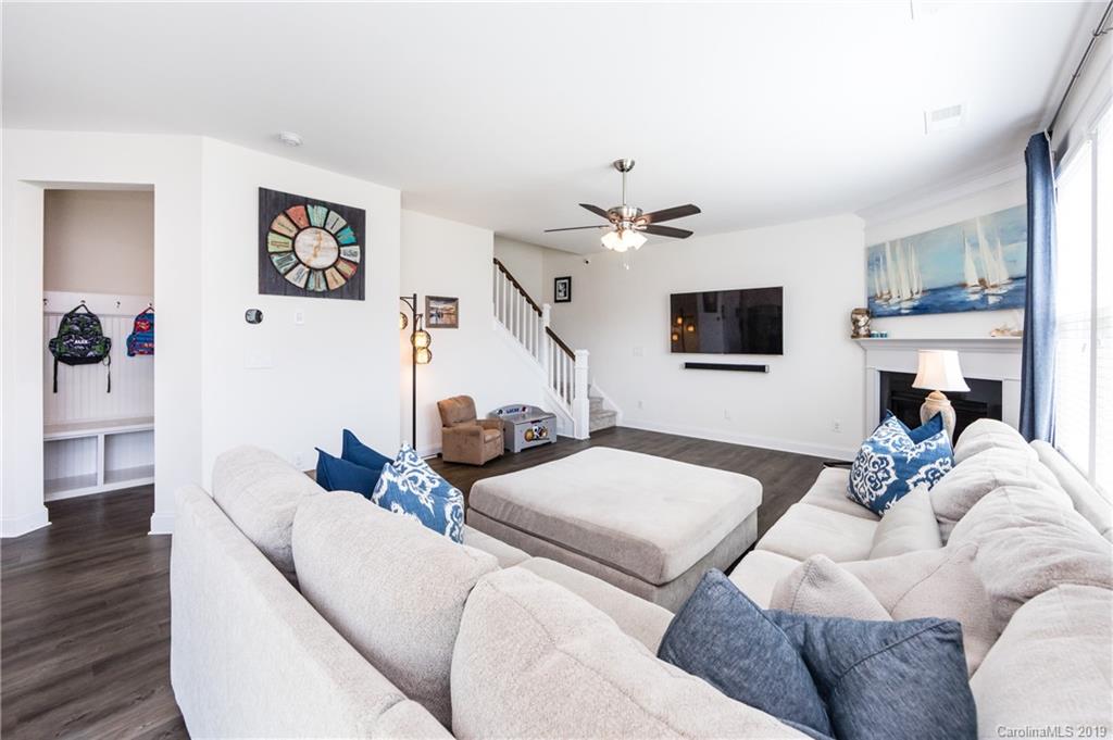 213 Morgan's Branch Road Belmont, NC 28012 - Photo 20 of 41 a living room with furniture and a flat screen tv