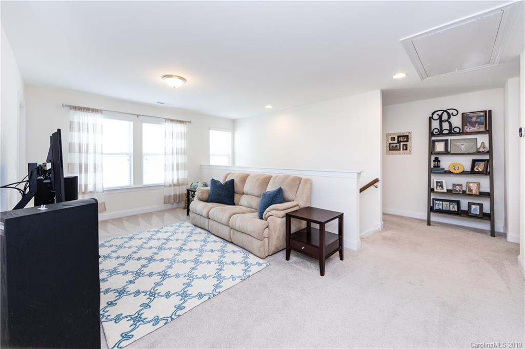 213 Morgan's Branch Road Belmont, NC 28012 - Photo 21 of 41 a living room with furniture and a window