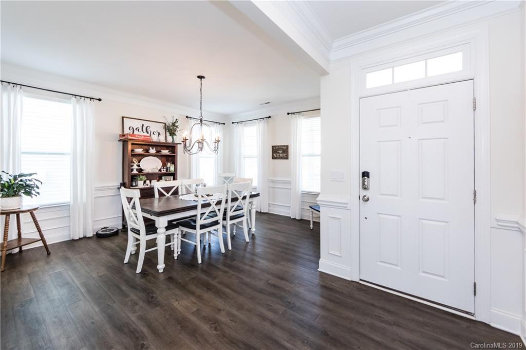 213 Morgan's Branch Road Belmont, NC 28012 - Photo 4 of 41 a view of a dining room with furniture window and wooden floor
