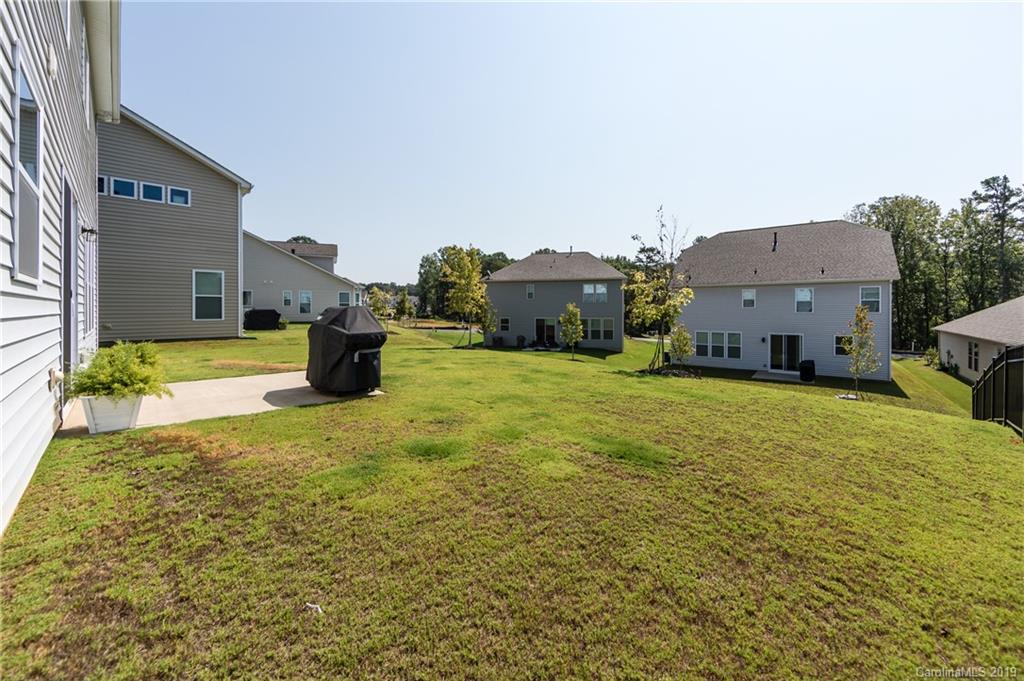 213 Morgan's Branch Road Belmont, NC 28012 - Photo 36 of 41 a view of a house with a yard