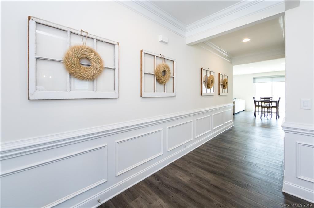 213 Morgan's Branch Road Belmont, NC 28012 - Photo 5 of 41 a hallway with a painting on the wall and a window