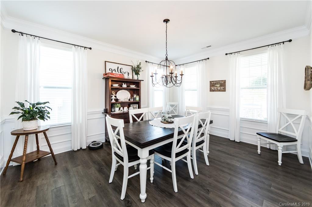 213 Morgan's Branch Road Belmont, NC 28012 - Photo 7 of 41 a view of a dining room with furniture window and wooden floor