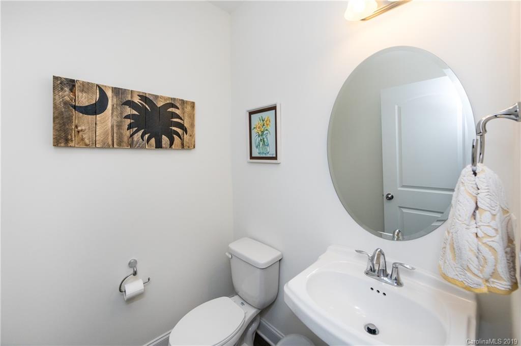 213 Morgan's Branch Road Belmont, NC 28012 - Photo 10 of 41 a bathroom with a toilet sink and mirror
