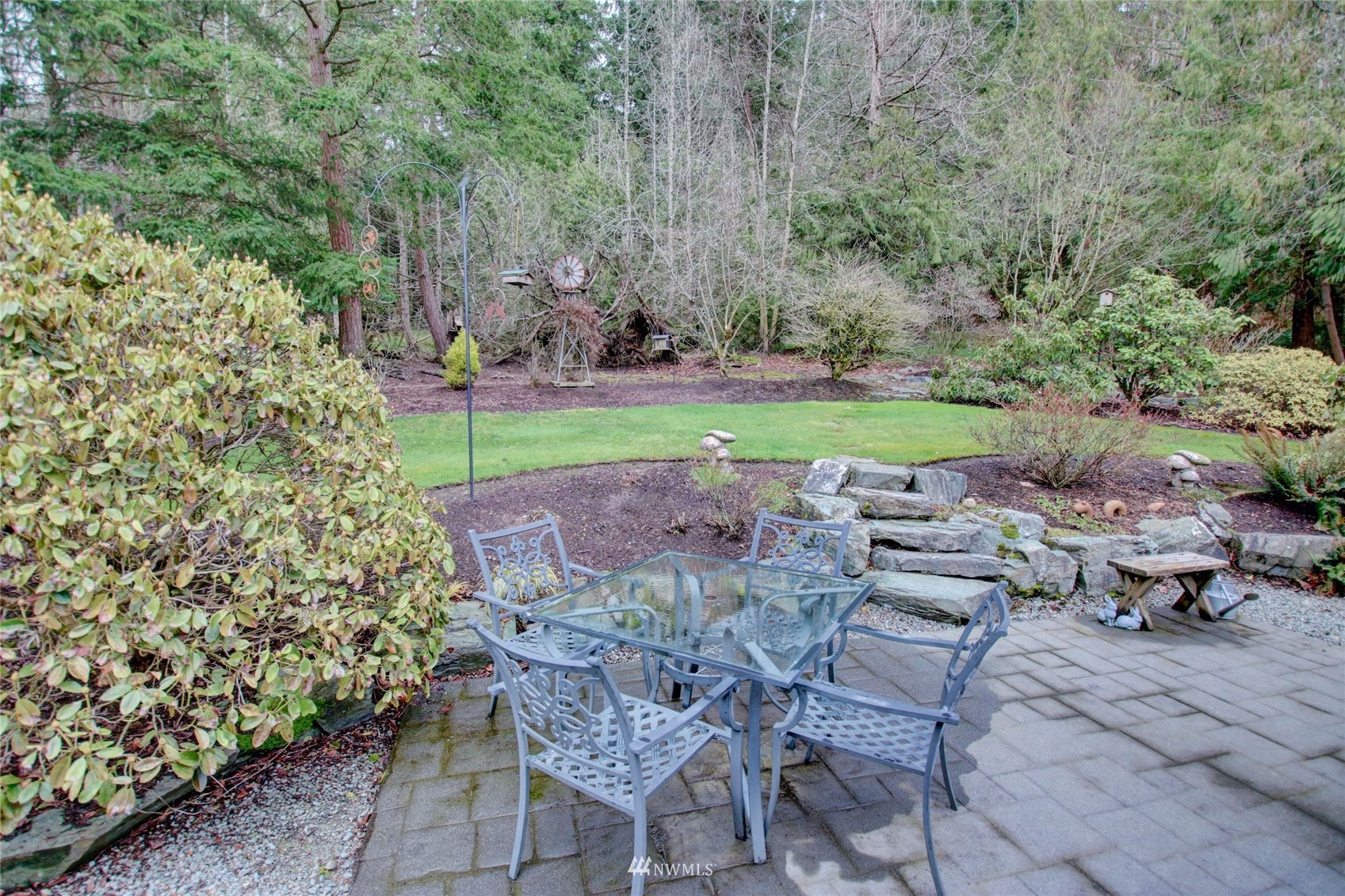 18849 Cascade Ridge Court Mount Vernon, WA 98274 - Photo 29 of 38 a view of a backyard with sitting area