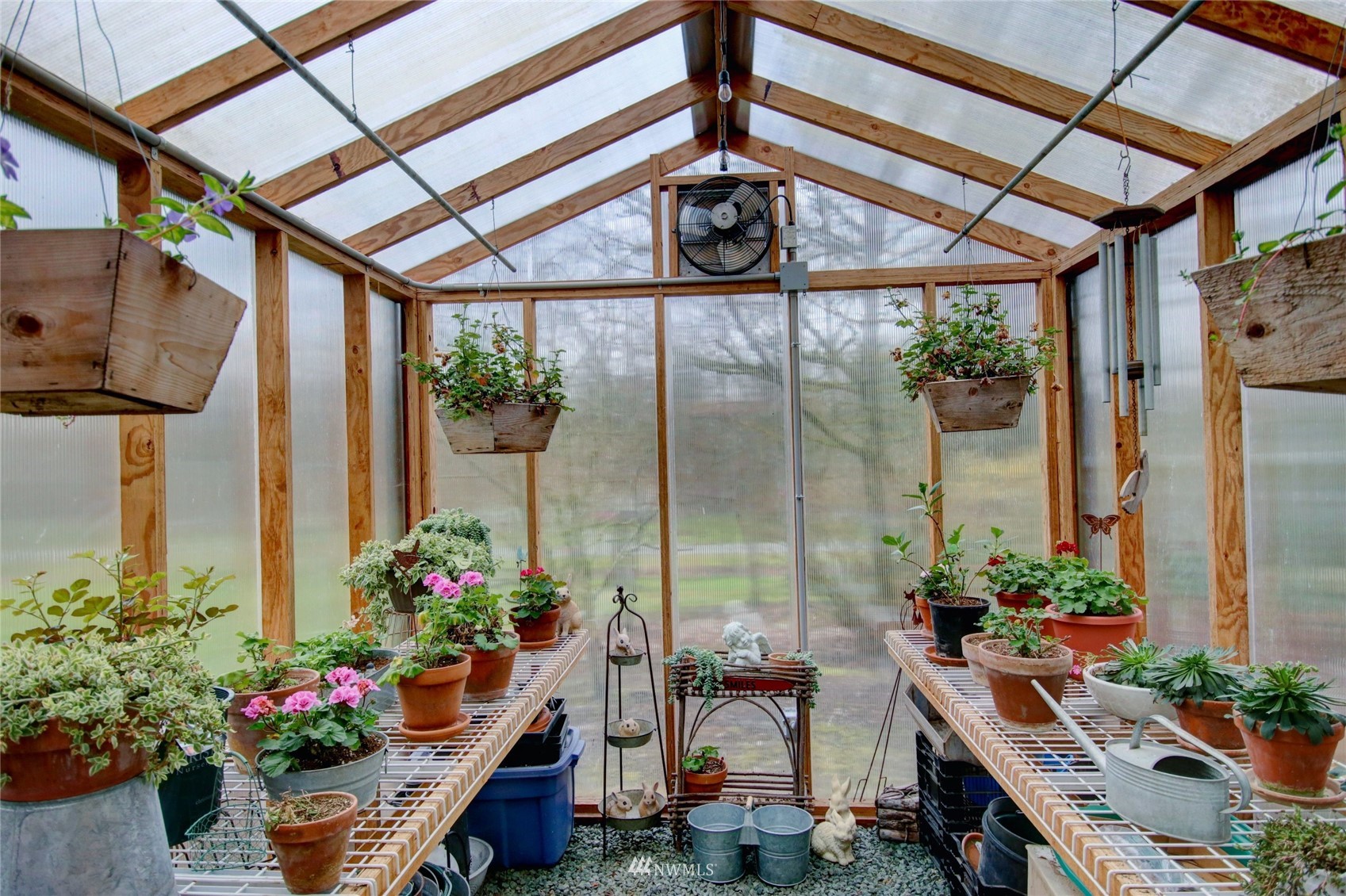 18849 Cascade Ridge Court Mount Vernon, WA 98274 - Photo 32 of 38 a outdoor space with lots of potted plants
