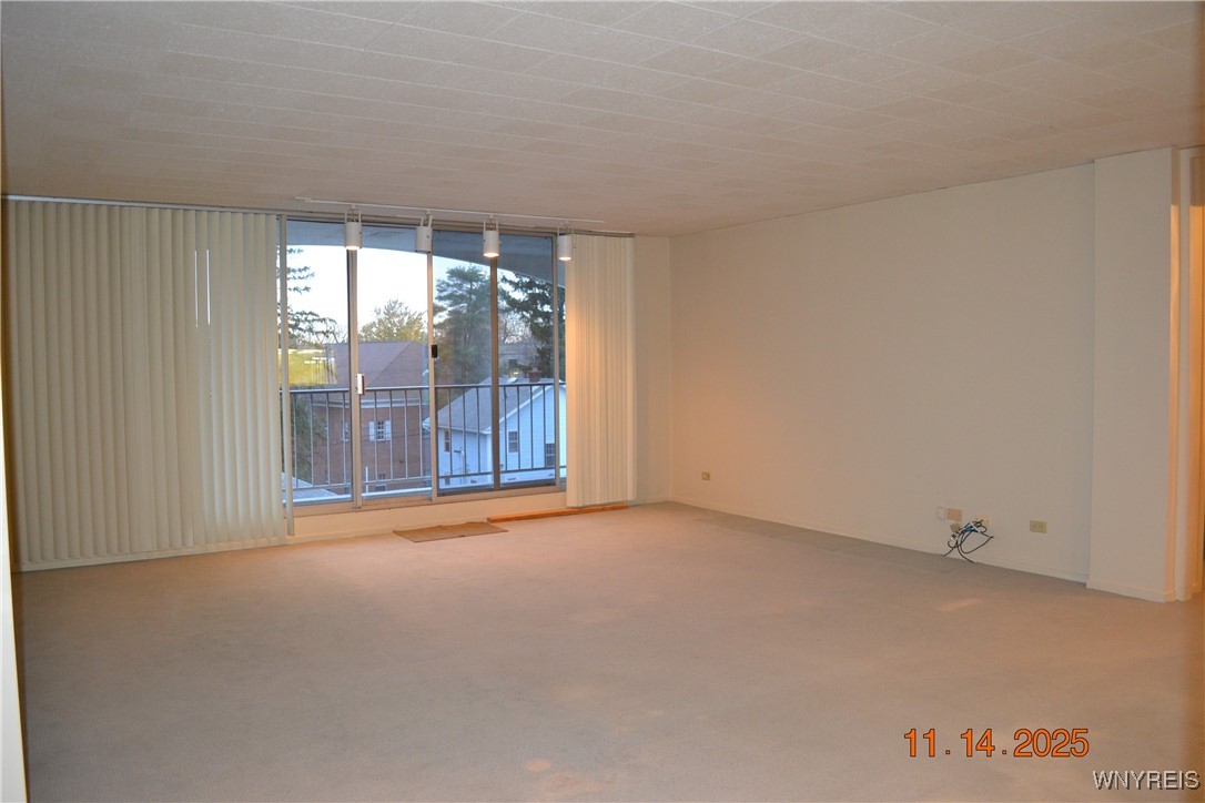 5854 Main Street, Unit 301 Amherst, NY 14221 - Photo 8 of 14 Living Dining Combo