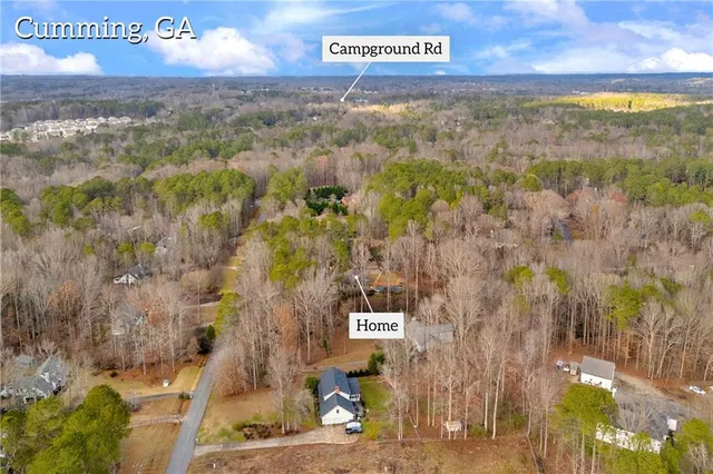 a picture of a bathroom with a picture of a sign