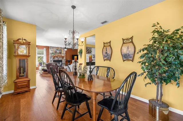 a view of a livingroom with workspace and a window