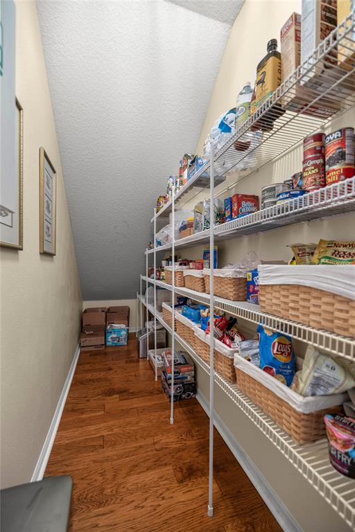 10264 West Springtree Lane Crystal River, FL 34428 - Photo 23 of 87 a room with storage and a white wooden cabinets