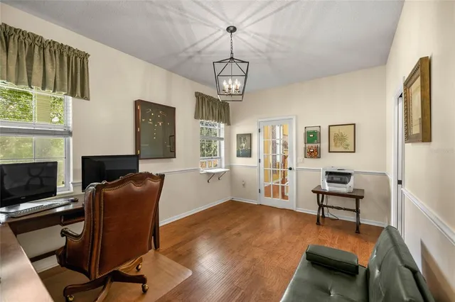 a view of a livingroom with wooden floor