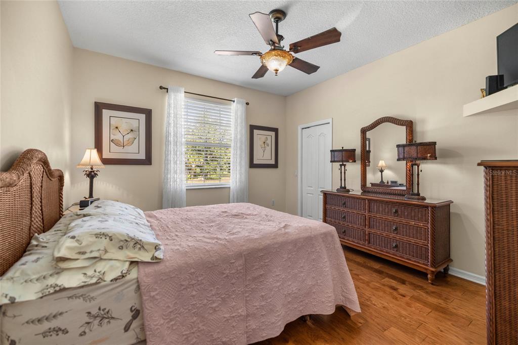 10264 West Springtree Lane Crystal River, FL 34428 - Photo 29 of 87 a bedroom with a bed and a dresser