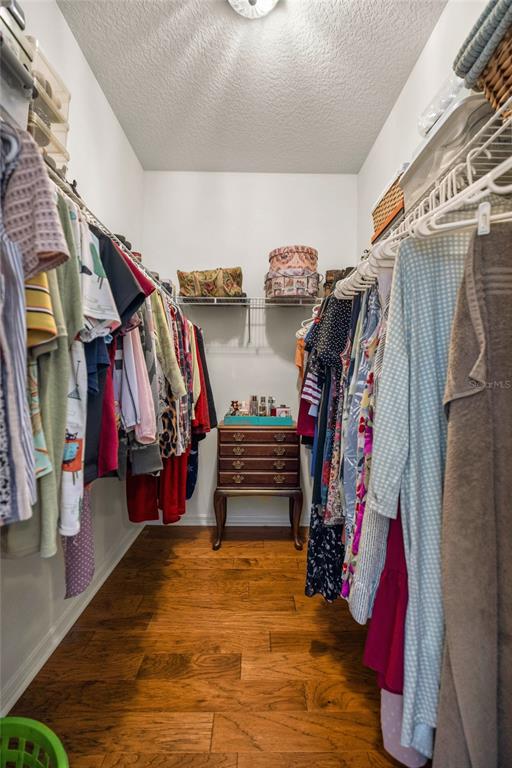 10264 West Springtree Lane Crystal River, FL 34428 - Photo 31 of 87 a view of walk in closet with clothes and shoes