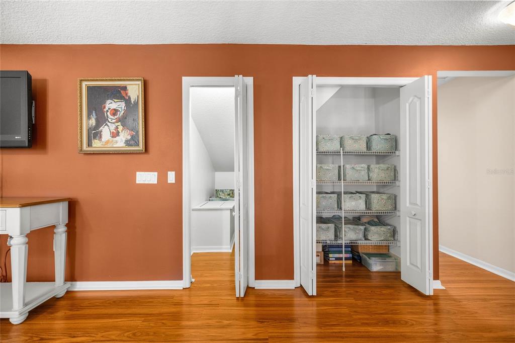 10264 West Springtree Lane Crystal River, FL 34428 - Photo 40 of 87 a view of a livingroom with wooden floor and a flat screen tv