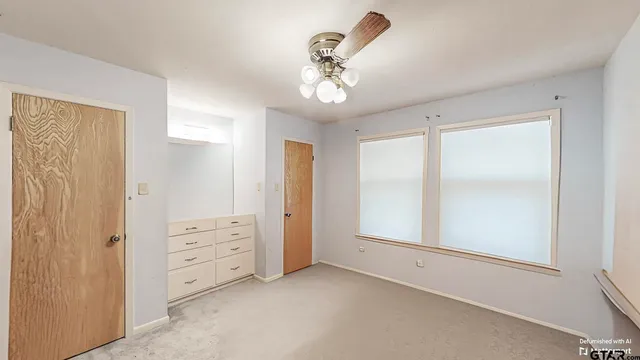 a view of bathroom with a toilet and a shower