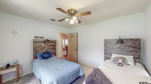 a view of room with gym equipment