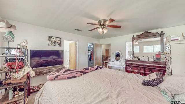 a view of water heater room with windows