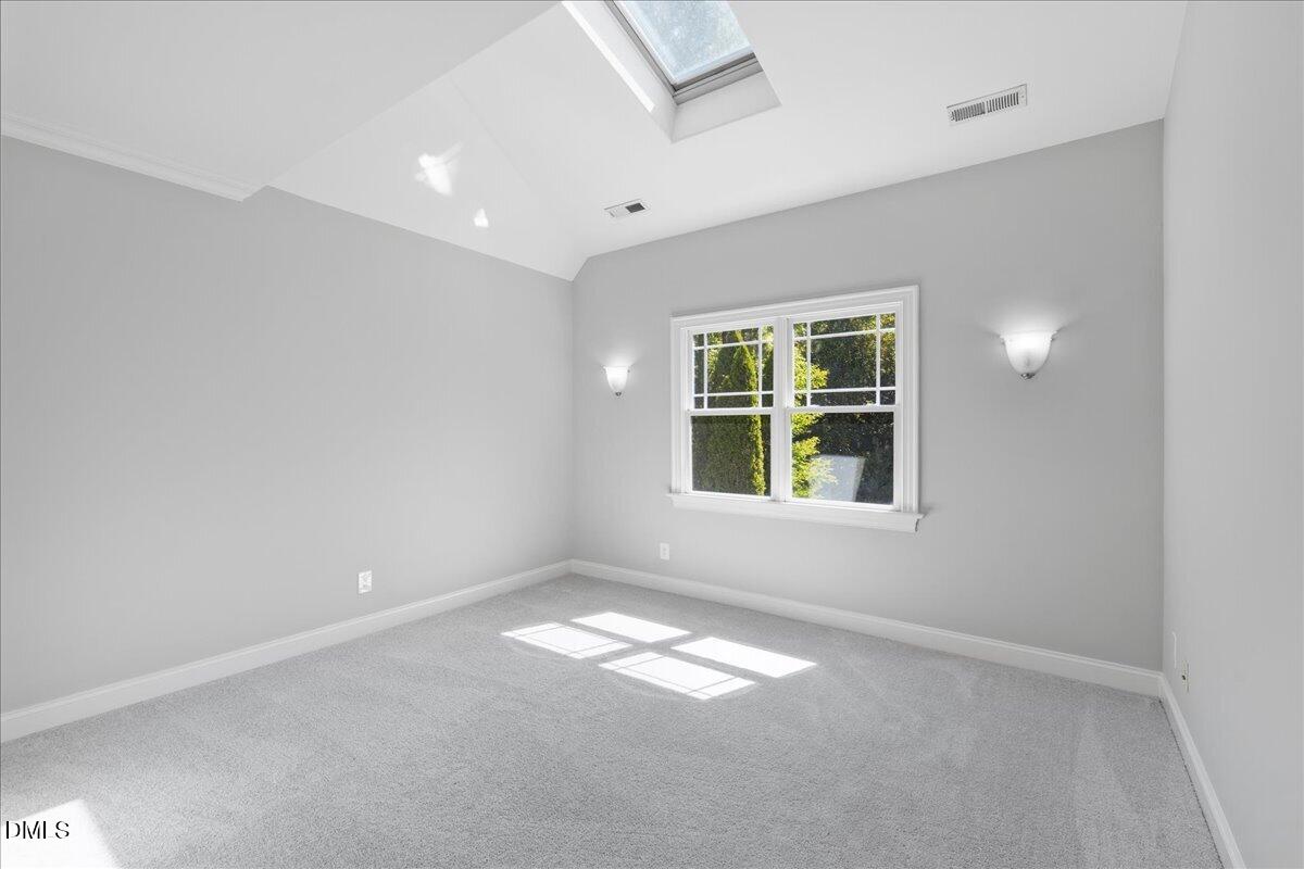 7324 Sparhawk Road Wake Forest, NC 27587 - Photo 47 of 74 Bedroom with skylight
