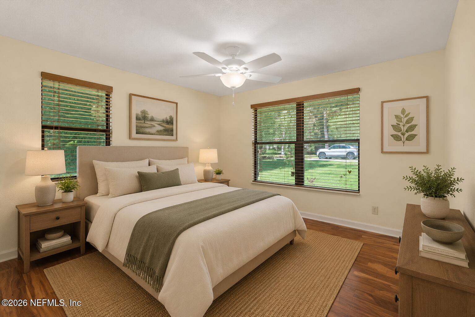 145 Finnigan Road Satsuma, FL 32189 - Photo 9 of 43 a bedroom with a large bed and a window