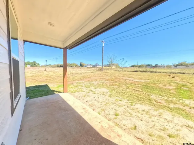 a view of an ocean & kitchen