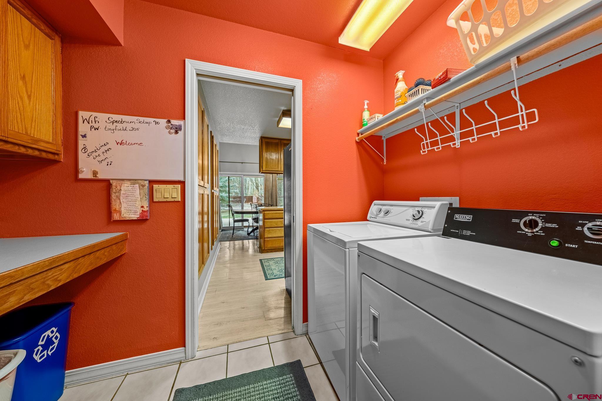 780 Waterfall Lane Durango, CO 81301 - Photo 15 of 35 a utility room with dryer and washer