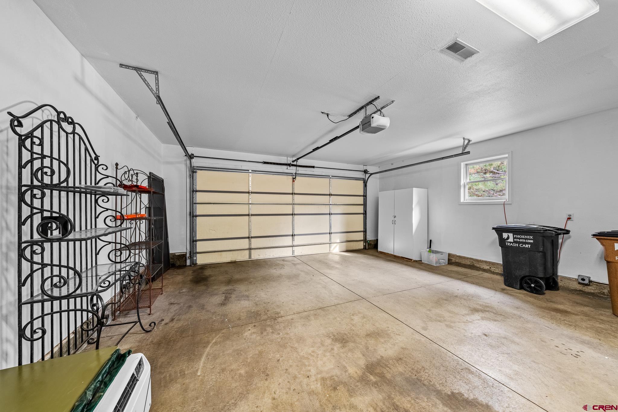 780 Waterfall Lane Durango, CO 81301 - Photo 16 of 35 a view of a garage with furniture