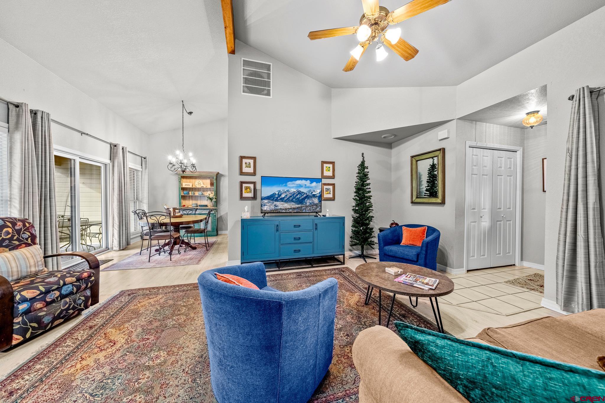 780 Waterfall Lane Durango, CO 81301 - Photo 9 of 35 a living room with furniture and a dining table