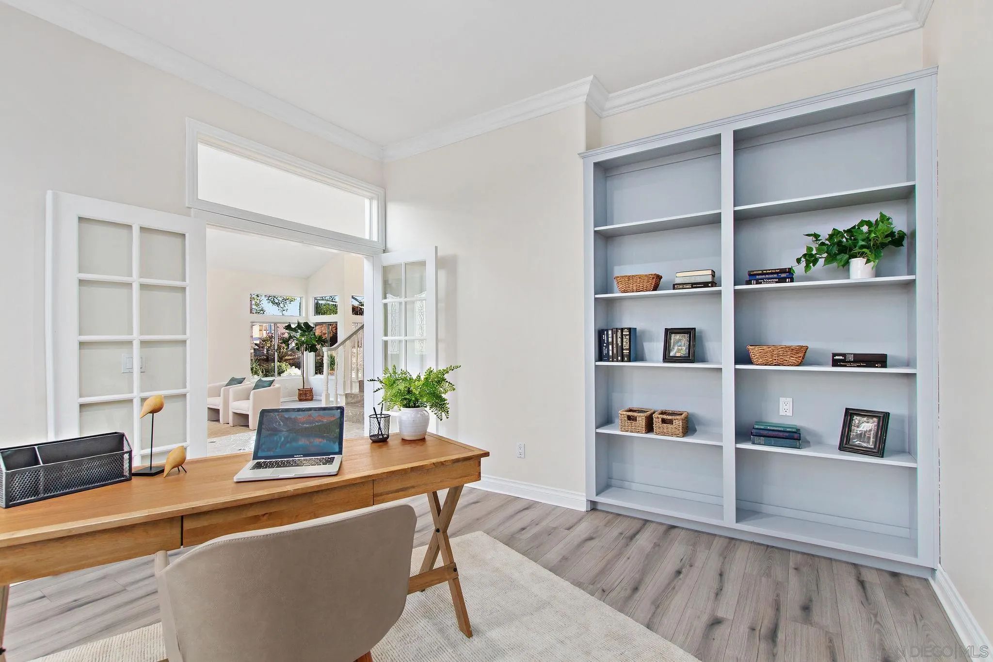 1623 Dewitt Estates Road Alpine, CA 91901 - Photo 16 of 53 a living room with furniture and a book shelf
