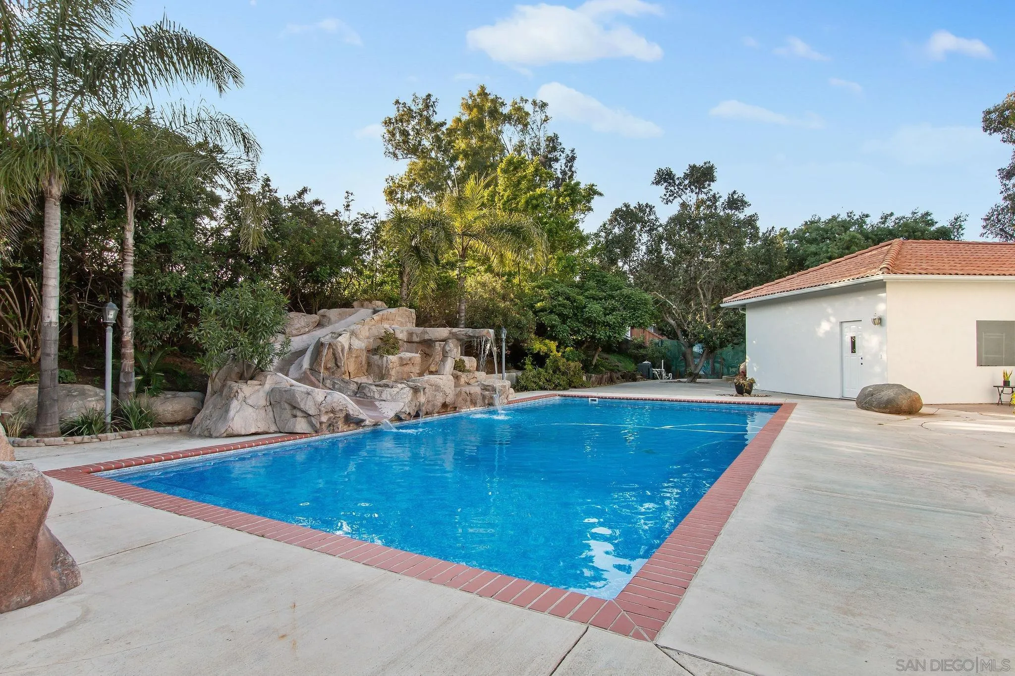 1623 Dewitt Estates Road Alpine, CA 91901 - Photo 33 of 53 a view of a backyard with swimming pool