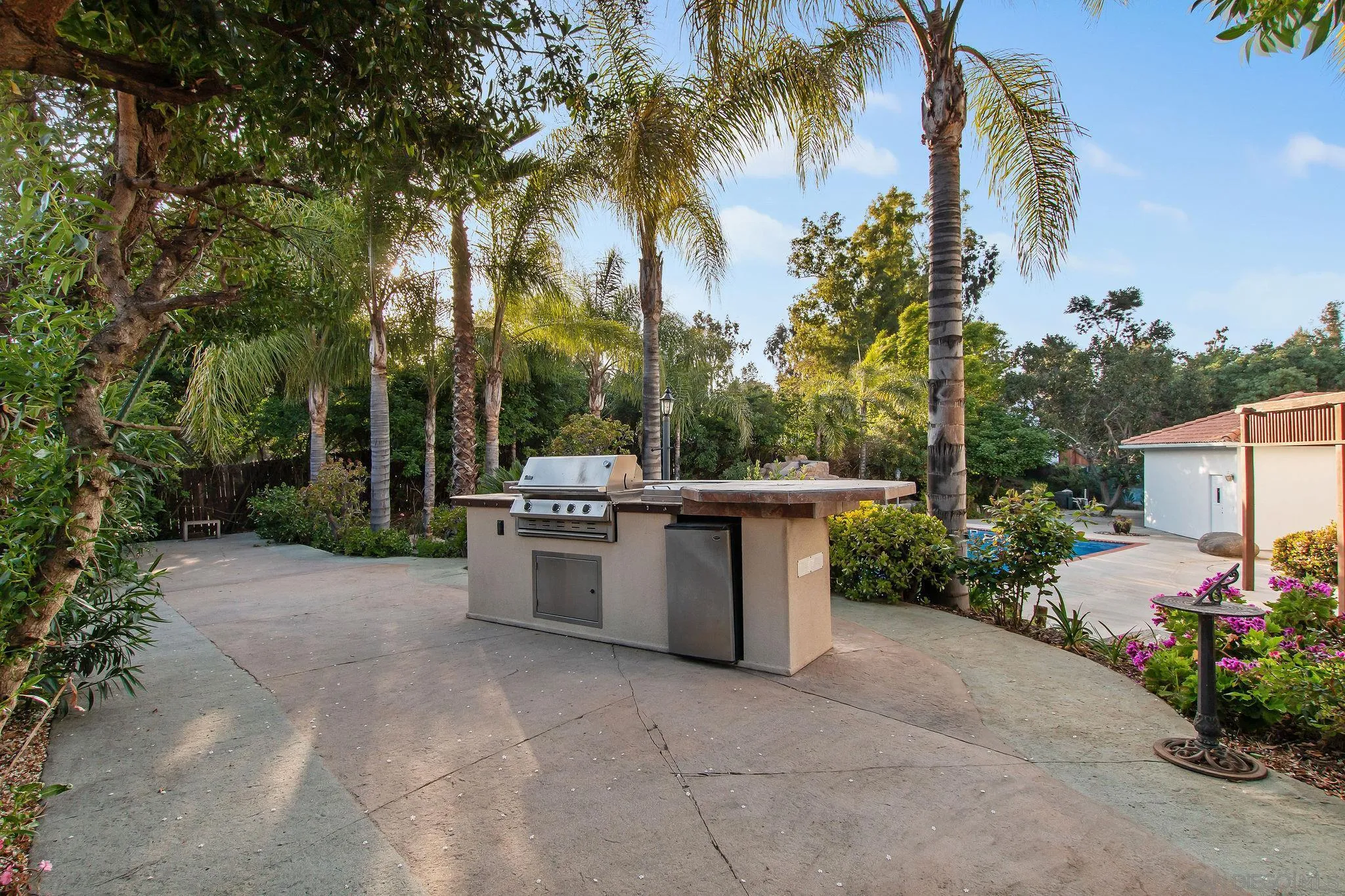 1623 Dewitt Estates Road Alpine, CA 91901 - Photo 38 of 53 a view of backyard with outdoor seating and trees